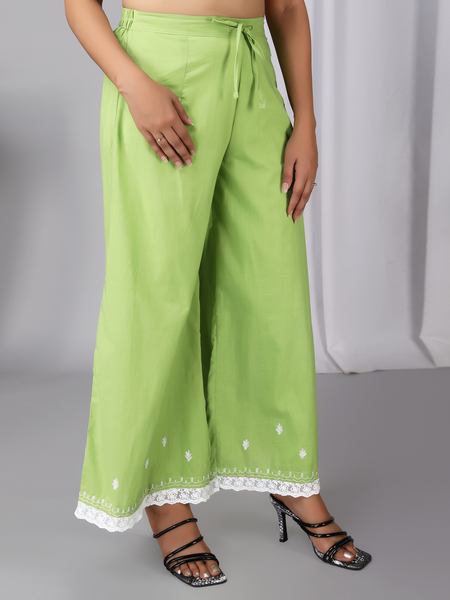 Buy Textured Palazzo Pants with Tie Up Pink For Women | Styli Bahrain